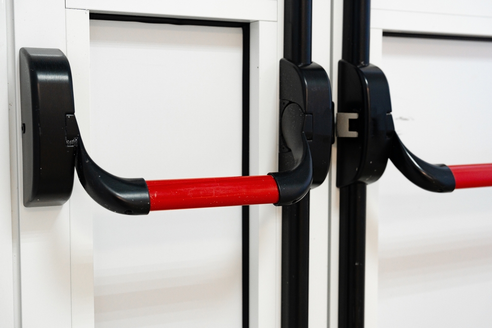 white commercial door with black and red