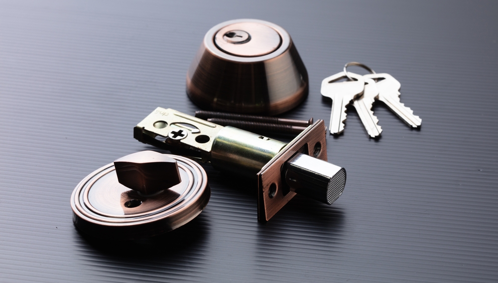 Deadbolt locks on black surface